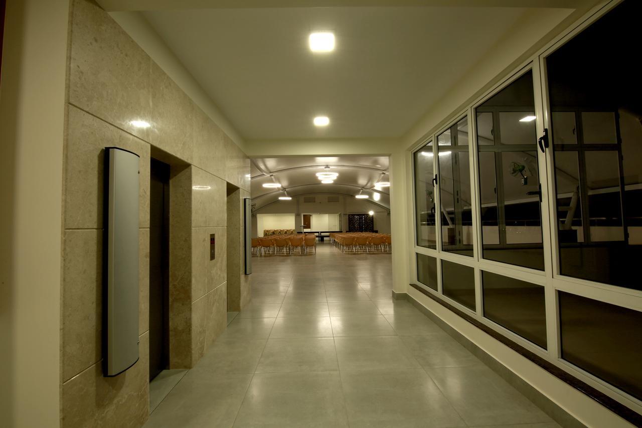 ホテル Palguni Residency ハッサン エクステリア 写真