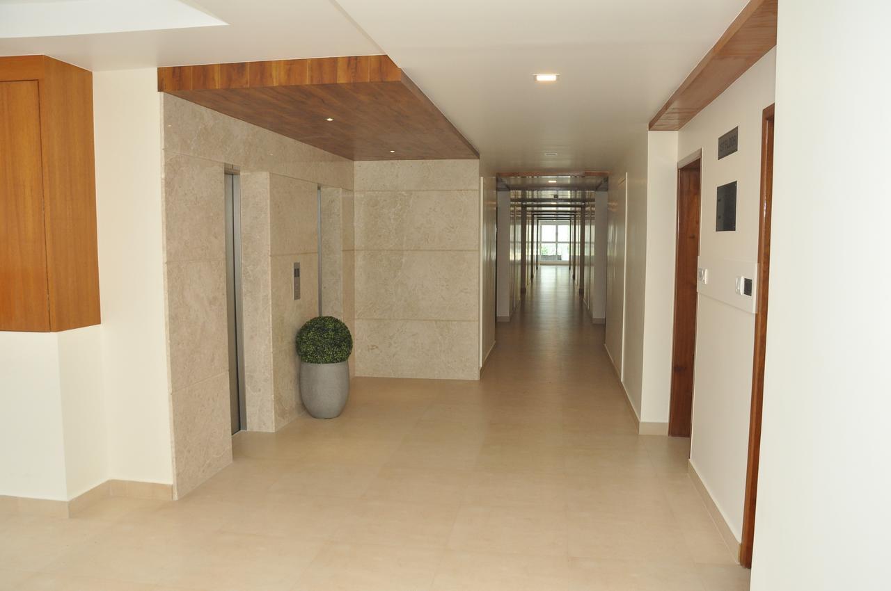 ホテル Palguni Residency ハッサン エクステリア 写真