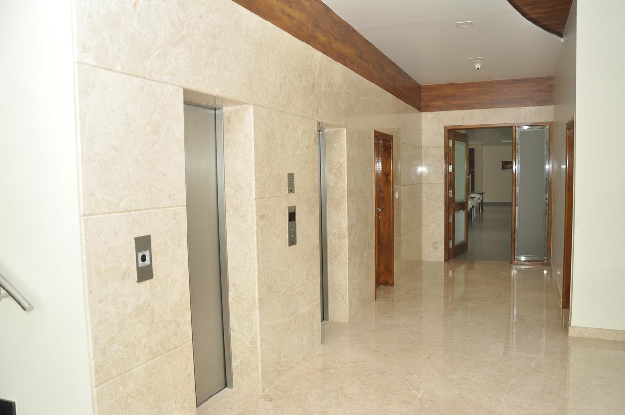 ホテル Palguni Residency ハッサン エクステリア 写真