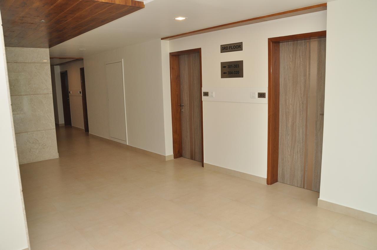 ホテル Palguni Residency ハッサン エクステリア 写真