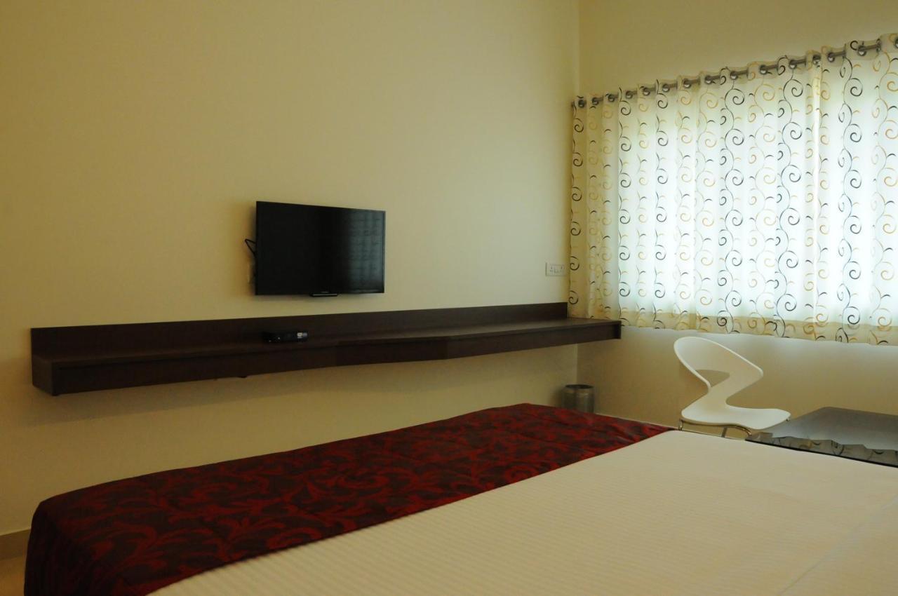 ホテル Palguni Residency ハッサン エクステリア 写真